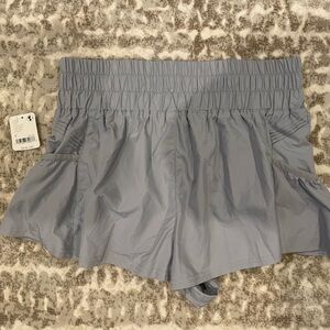 Brand new with tags Free People get your flirt on shorts. Size small, gray.